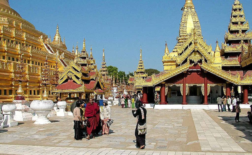Golden temples are a feature throughout Myanmar, where the people are devout Buddhists. Golden temples are a feature throughout Myanmar, where the people are devout Buddhists.